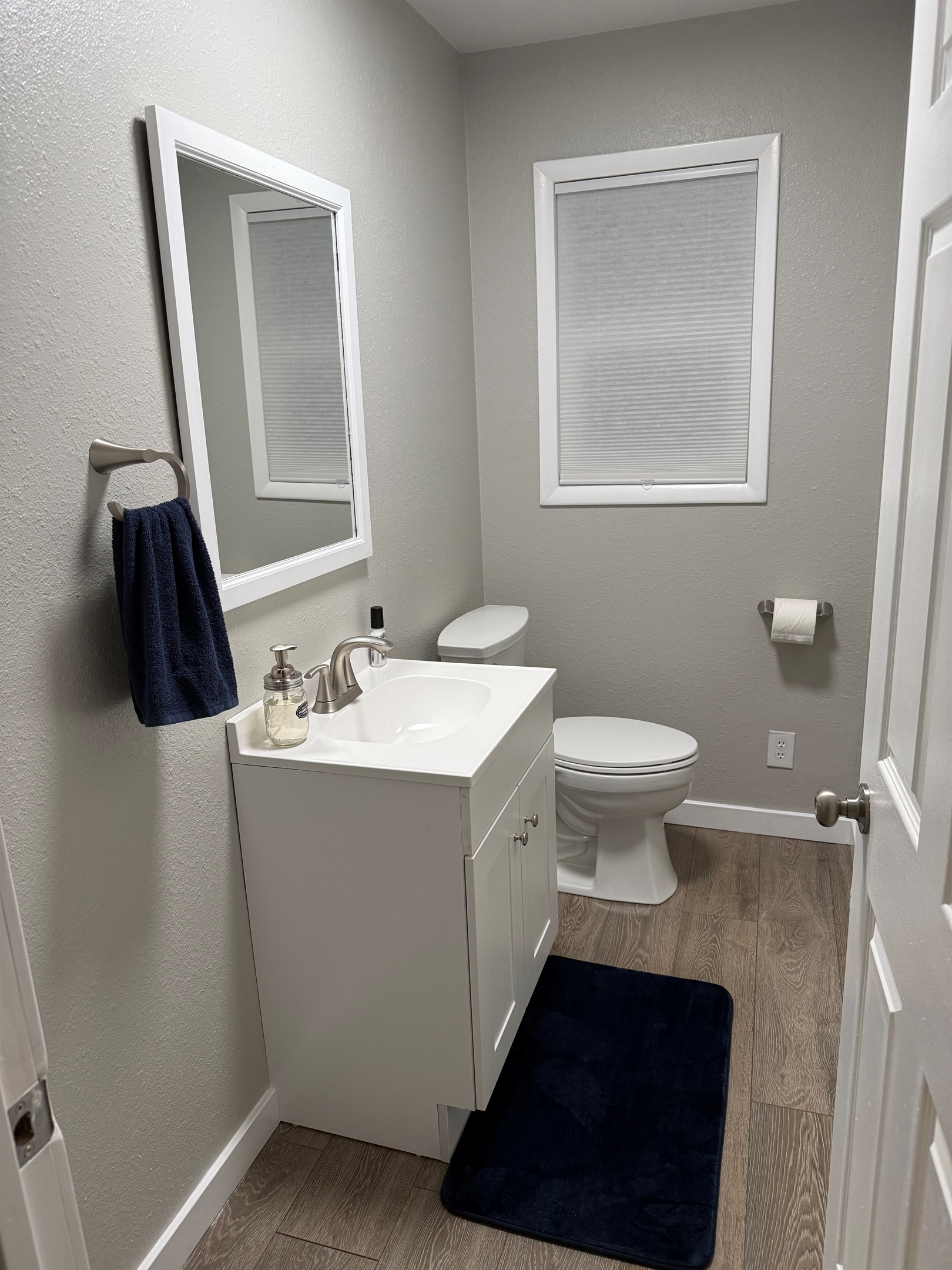Half bathroom — simple and steps away from the kitchen