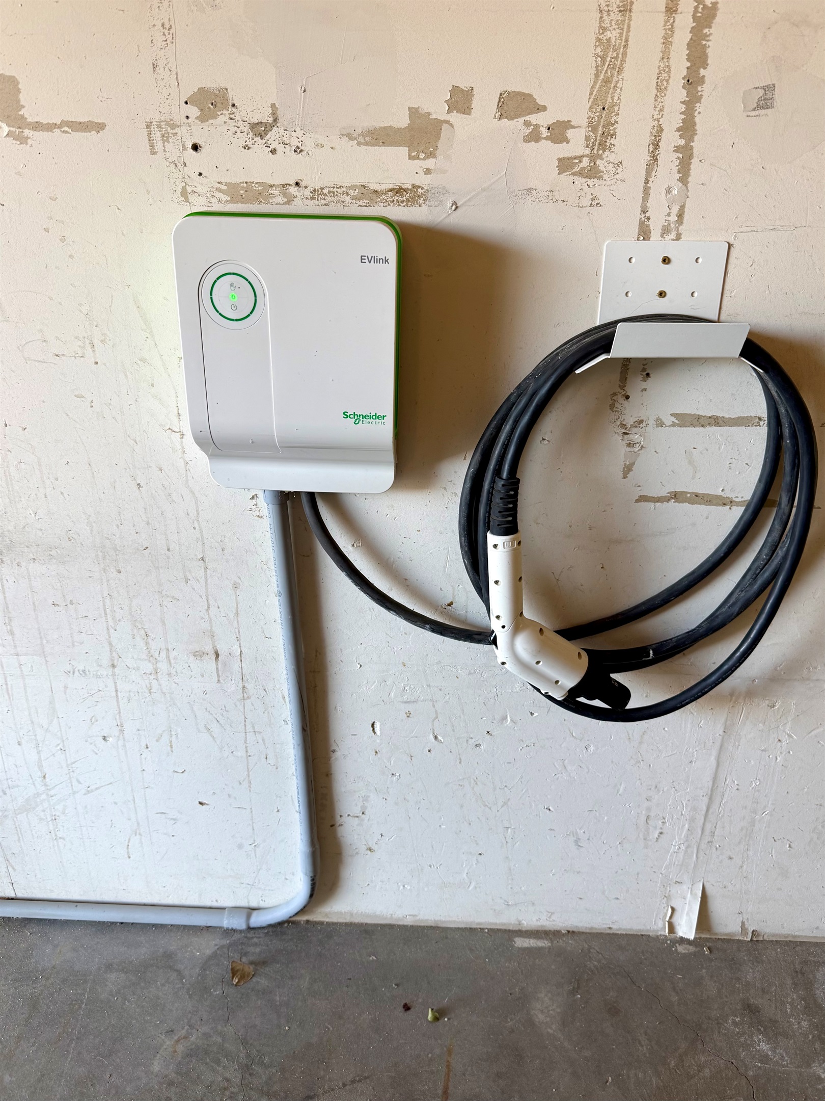 Complimentary 30amp J1772 EV charger in garage