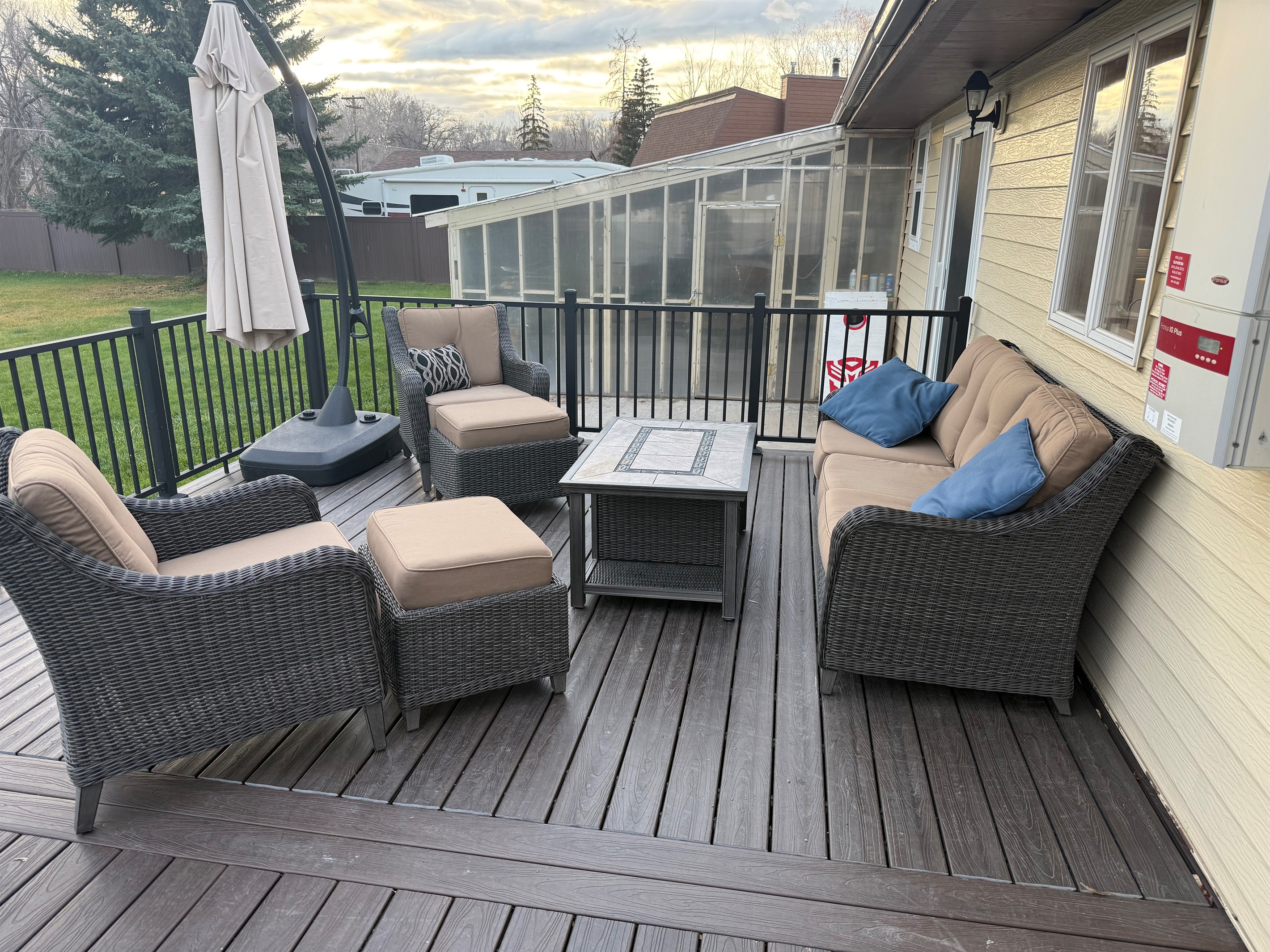 Relax on the deck overlooking the back yard